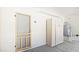Functional garage space with storage cabinets and water heater at 23853 W Hammond Ln, Buckeye, AZ 85326