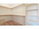 Spacious walk-in closet with shelving and ample storage space at 23853 W Hammond Ln, Buckeye, AZ 85326