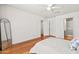 Bright bedroom with ceiling fan, ensuite bathroom, and large mirror at 255 S Kyrene Rd # 139, Chandler, AZ 85226