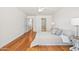 Spacious bedroom with wood flooring and a view into the hallway at 255 S Kyrene Rd # 139, Chandler, AZ 85226