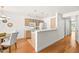 Well-lit kitchen and dining area featuring modern appliances, with hardwood floors at 255 S Kyrene Rd # 139, Chandler, AZ 85226