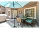 Comfortable patio with cozy seating, umbrella, and views of the beautiful landscape at 255 S Kyrene Rd # 139, Chandler, AZ 85226