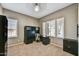 Bright bedroom with built-in desk, plantation shutters, and neutral decor at 31133 N 132Nd Ln, Peoria, AZ 85383