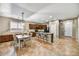 Eat-in kitchen boasts updated appliances, ample counter space, and cozy breakfast nook at 31133 N 132Nd Ln, Peoria, AZ 85383