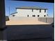 Spacious backyard area with block wall fencing, awaiting landscaping design and personalization at 3125 S 232Nd Ave, Buckeye, AZ 85326
