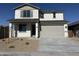 Charming two-story home featuring a two-car garage and neutral color palette at 3125 S 232Nd Ave, Buckeye, AZ 85326