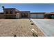 Charming home featuring a three-car garage, a low maintenance yard and a classic desert aesthetic at 3145 W Acoma Dr, Phoenix, AZ 85053