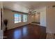 Bright living room featuring hardwood floors, neutral walls and an abundance of natural light at 3145 W Acoma Dr, Phoenix, AZ 85053