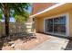 Private back patio area, featuring brick and concrete, enclosed by a wooden fence at 3350 W Las Palmaritas Dr, Phoenix, AZ 85051