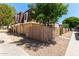 Two-story townhome featuring a secure fence that enhances the privacy and charm at 3350 W Las Palmaritas Dr, Phoenix, AZ 85051