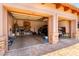 Two-car garage featuring high ceilings, ample storage space, and an automatic door at 4041 N Silver Ridge Cir, Mesa, AZ 85207