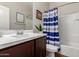 Bathroom with a combined shower and tub and a single sink vanity at 4108 N 304Th Ln, Buckeye, AZ 85396