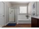 Bright bathroom showcasing a shower, soaking tub, and wood look ceramic tile floors at 4108 N 304Th Ln, Buckeye, AZ 85396