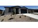 A charming home featuring low maintenance landscaping, a two car garage, and neutral tones at 4328 E Brook Lynn Pl, San Tan Valley, AZ 85143