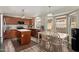 Beautiful kitchen with granite countertops, stainless steel appliances, and a breakfast nook at 4514 E Verbena Dr, Phoenix, AZ 85044