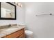 Bathroom vanity features granite countertops, wood cabinetry, and updated fixtures at 4901 E Kelton Ln # 1251, Scottsdale, AZ 85254