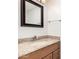 Bathroom vanity features granite countertops, wood cabinetry, and updated fixtures at 4901 E Kelton Ln # 1251, Scottsdale, AZ 85254