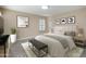 Serene bedroom with neutral tones and comfortable furnishings at 5998 N 78Th St # 116, Scottsdale, AZ 85250