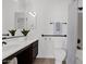 Bathroom with a dark wood vanity, tile floors and shower at 7261 E Norland St, Mesa, AZ 85207