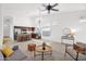 Open living area with tile floors and view of the kitchen, dining area and neutral decor at 7261 E Norland St, Mesa, AZ 85207