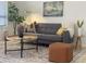 Comfortable living room with stylish decor, modern furnishings, and natural light at 7261 E Norland St, Mesa, AZ 85207