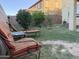 Inviting backyard with mature landscaping and comfortable lounge seating at 7321 S 48Th Dr, Laveen, AZ 85339