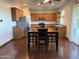 Spacious kitchen with wooden cabinets, stainless steel appliances, and an island at 7321 S 48Th Dr, Laveen, AZ 85339