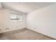 Bright bedroom with neutral carpet, natural light and a view to the exterior at 736 E Loyola Dr, Tempe, AZ 85282