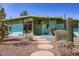 Attractive home featuring desert landscaping, a stone walkway, and an inviting entrance at 736 E Loyola Dr, Tempe, AZ 85282