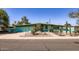 Charming single-story home with unique desert landscaping and vibrant color scheme at 736 E Loyola Dr, Tempe, AZ 85282