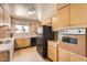 Cozy kitchen featuring functional appliances and a practical layout at 736 E Loyola Dr, Tempe, AZ 85282