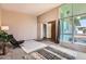 Spacious living room with large windows, neutral tones, and a comfortable layout at 736 E Loyola Dr, Tempe, AZ 85282