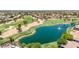An aerial view of the golf course featuring a pond at 7401 W Arrowhead Club Dr # 2067, Glendale, AZ 85308