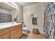 Bathroom featuring a large vanity with plenty of storage and a large mirror at 7401 W Arrowhead Club Dr # 2067, Glendale, AZ 85308