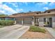 Beautiful home featuring a two-car garage, well maintained landscaping, and an inviting entryway at 7401 W Arrowhead Club Dr # 2067, Glendale, AZ 85308