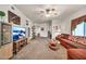 Open-concept living room featuring neutral walls and plush carpeting at 7401 W Arrowhead Club Dr # 2067, Glendale, AZ 85308