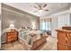 Serene main bedroom features a ceiling fan and lots of natural light at 7401 W Arrowhead Club Dr # 2067, Glendale, AZ 85308
