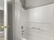 Bathroom featuring a white shower and tub combination with neutral gray walls at 8876 W Bluefield Ave, Peoria, AZ 85382