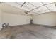 Spacious garage features painted walls, concrete floors, and plenty of space for multiple vehicles at 8876 W Bluefield Ave, Peoria, AZ 85382