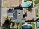 Complete aerial view of property, featuring a pool and solar panels on roof at 8908 W Sheridan St, Phoenix, AZ 85037
