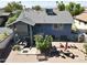 Well-kept backyard with large patio, upper deck, and cozy seating areas for relaxation at 8908 W Sheridan St, Phoenix, AZ 85037