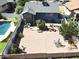 Spacious backyard with brick patio and ample seating, perfect for outdoor entertaining at 8908 W Sheridan St, Phoenix, AZ 85037