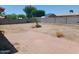 Large backyard with brick pavers, block fencing and trees at 9726 E Quarterline Rd, Mesa, AZ 85207