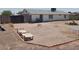 Spacious backyard with lounge chairs, block fencing and potential for customization at 9726 E Quarterline Rd, Mesa, AZ 85207