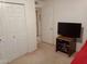 Bedroom with closet, doorway and television at 9726 E Quarterline Rd, Mesa, AZ 85207