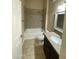 Bathroom features a bathtub with tile surround, toilet, and vanity with granite countertop at 10136 E Southern Ave # 3109, Mesa, AZ 85209