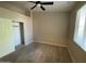 Bedroom featuring a ceiling fan, closet, and window at 10136 E Southern Ave # 3109, Mesa, AZ 85209