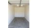 View of empty single car garage at 10136 E Southern Ave # 3109, Mesa, AZ 85209