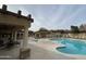 An outdoor seating area near the community pool and spa at 10136 E Southern Ave # 3109, Mesa, AZ 85209