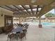 An outdoor seating area near the community pool and spa at 10136 E Southern Ave # 3109, Mesa, AZ 85209